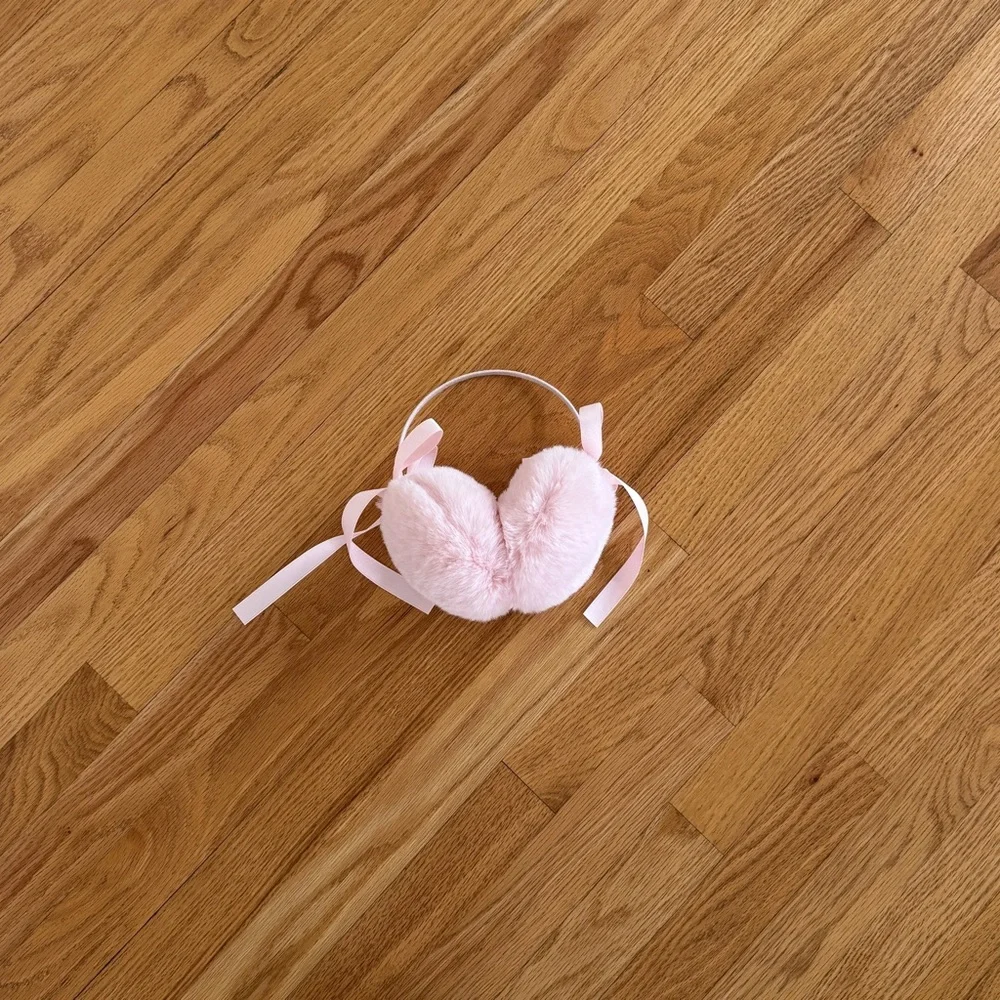 Light pink Pom Pom ear muffs fluffy with bows